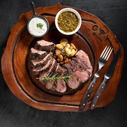 Sliced tenderloin on a wooden board