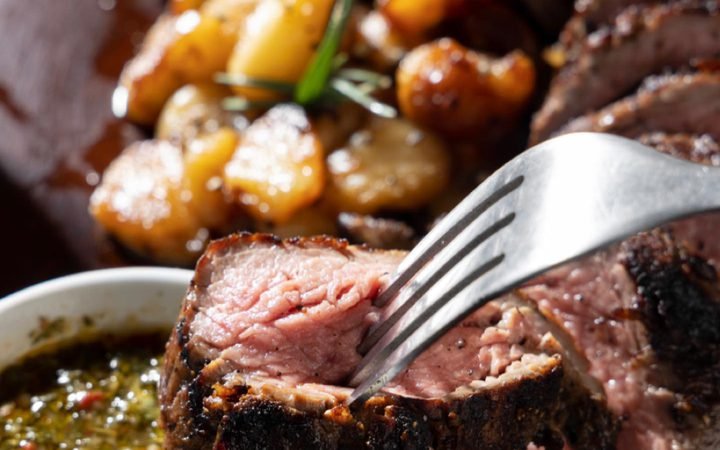 Sliced steak with chimichurri